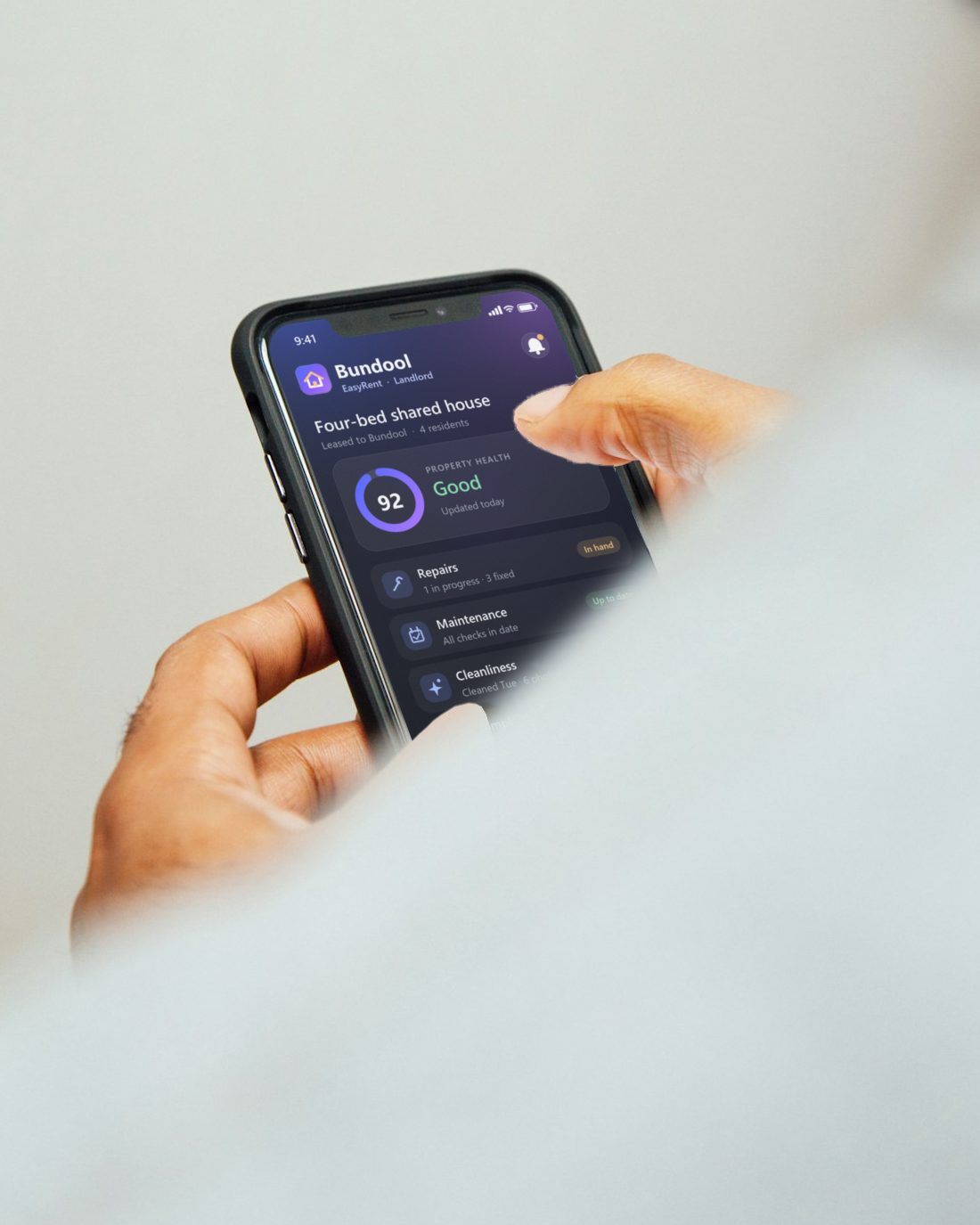 Over a landlord’s shoulder: their phone shows a property’s health in the Bundool EasyRent app